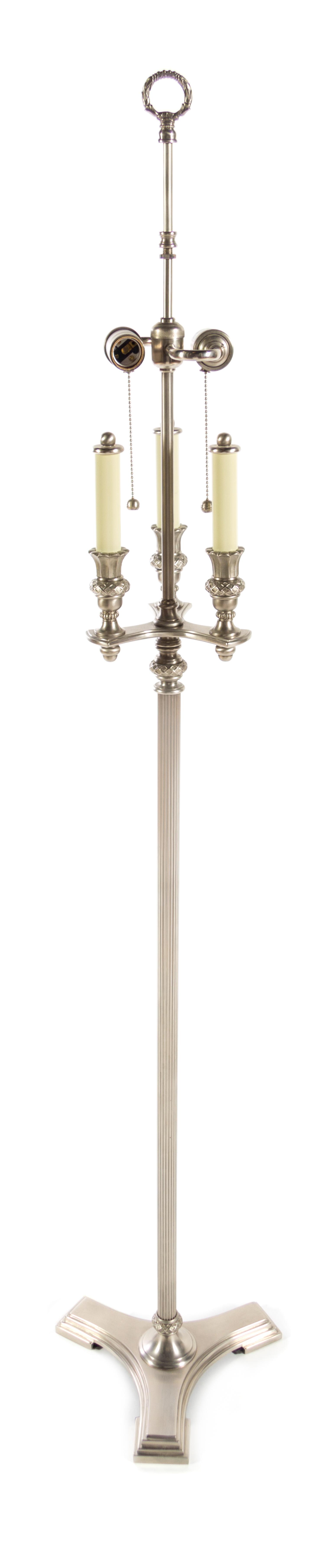 A Neoclassical Style Cast Metal Floor Lamp Height 61 inches. — 20TH CENTURY