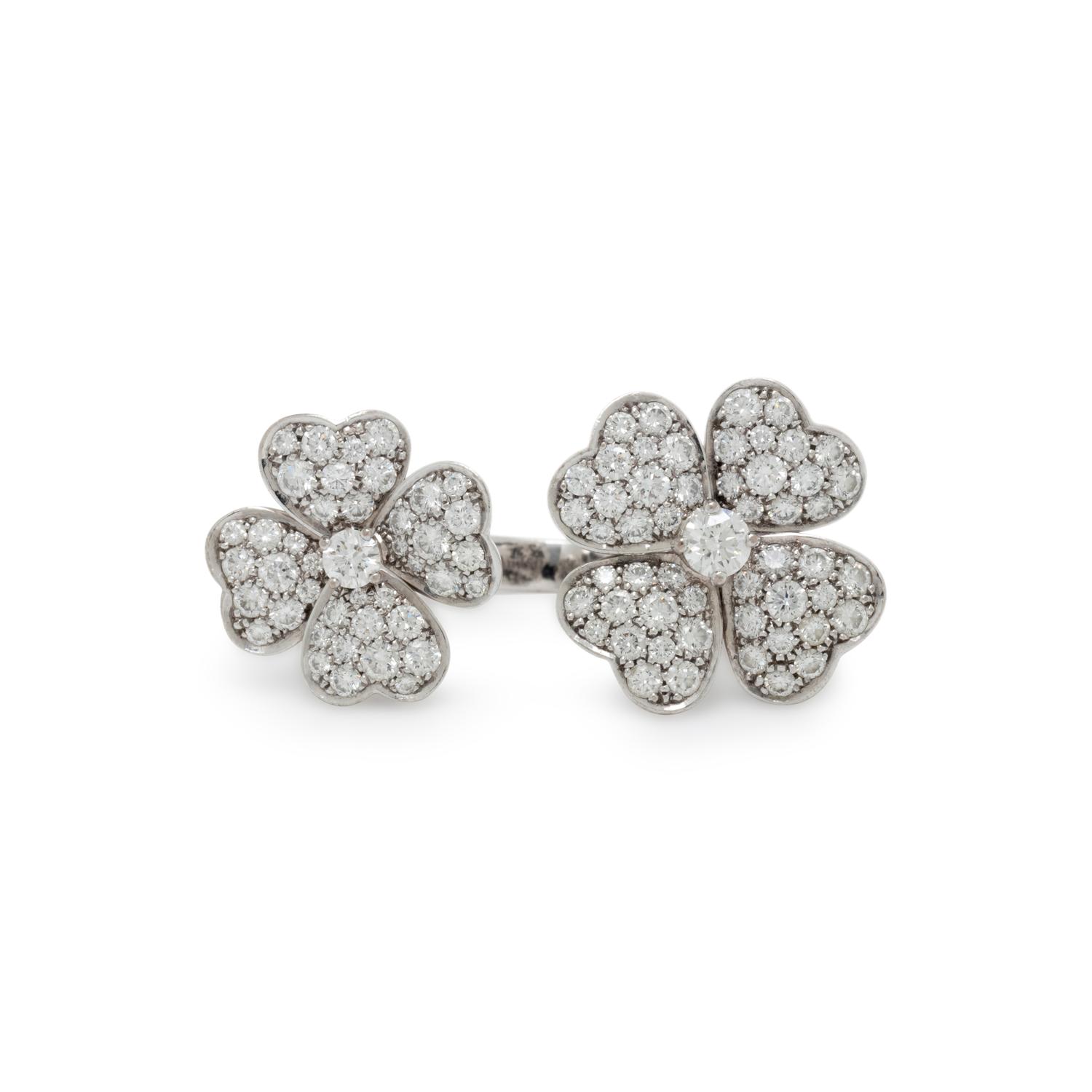 VAN CLEEF & ARPELS, DIAMOND AND WHITE GOLD 'COSMOS BETWEEN THE FINGER' RING