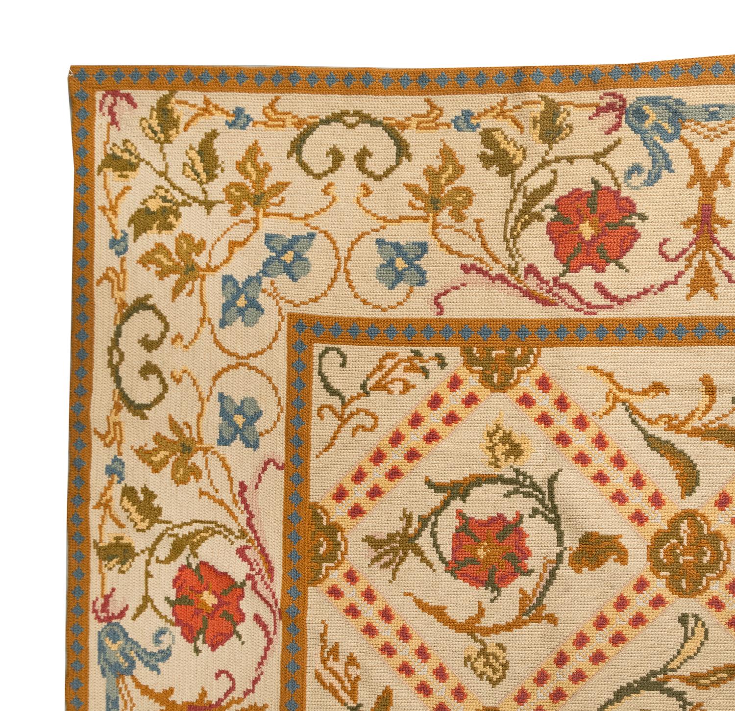 A Portuguese Needlepoint Rug