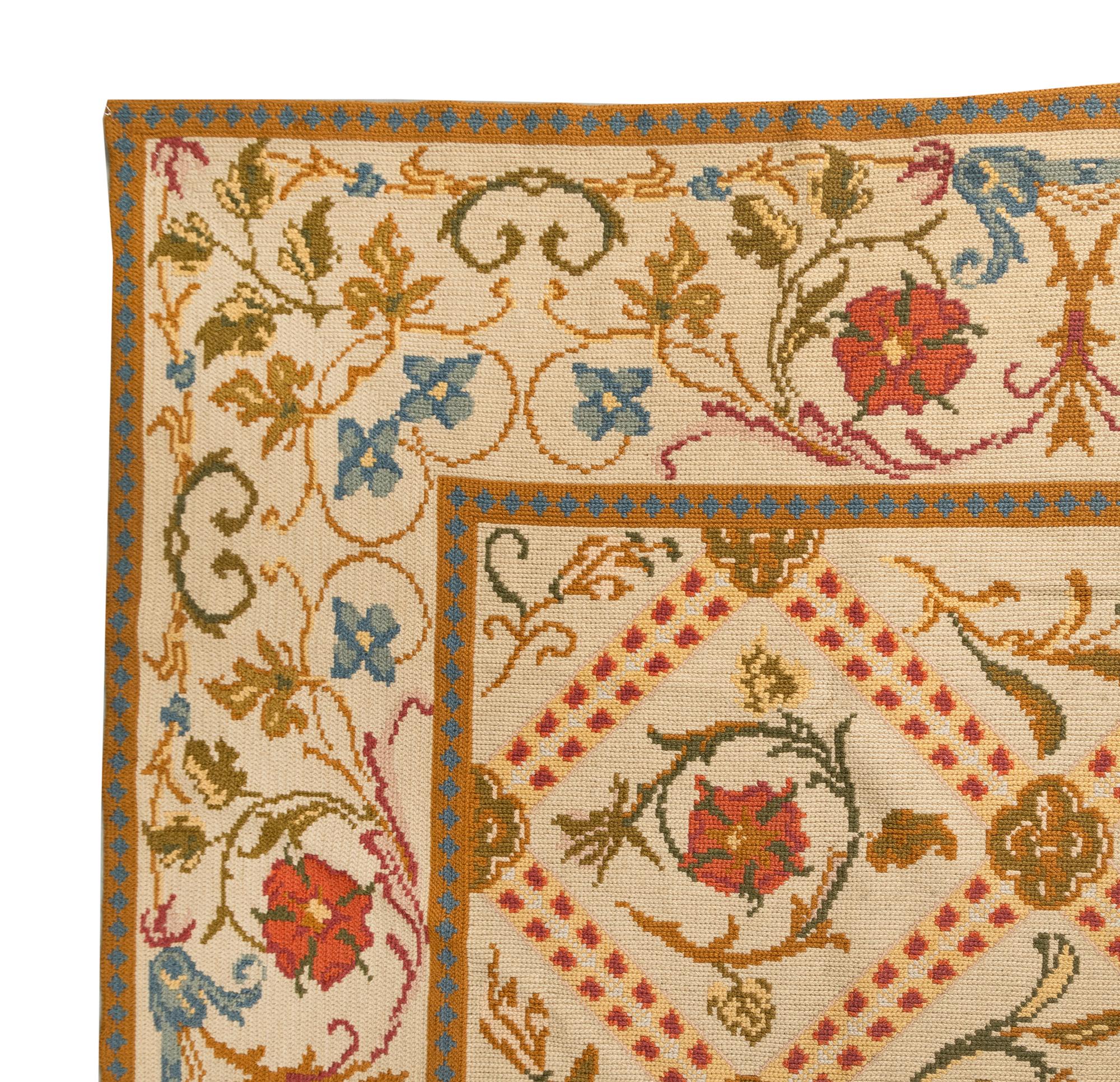 A Portuguese Needlepoint Rug