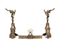 Pair of Neo-Grec Parcel-Gilt and Patinated Bronze Andirons and Fender — LATE 19TH CENTURY