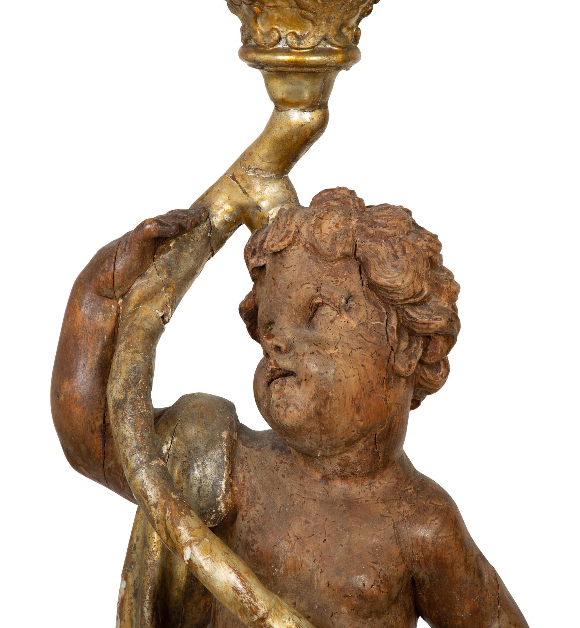 A Pair of Italian Painted and Parcel Gilt Figural Torcheres — 18TH CENTURY