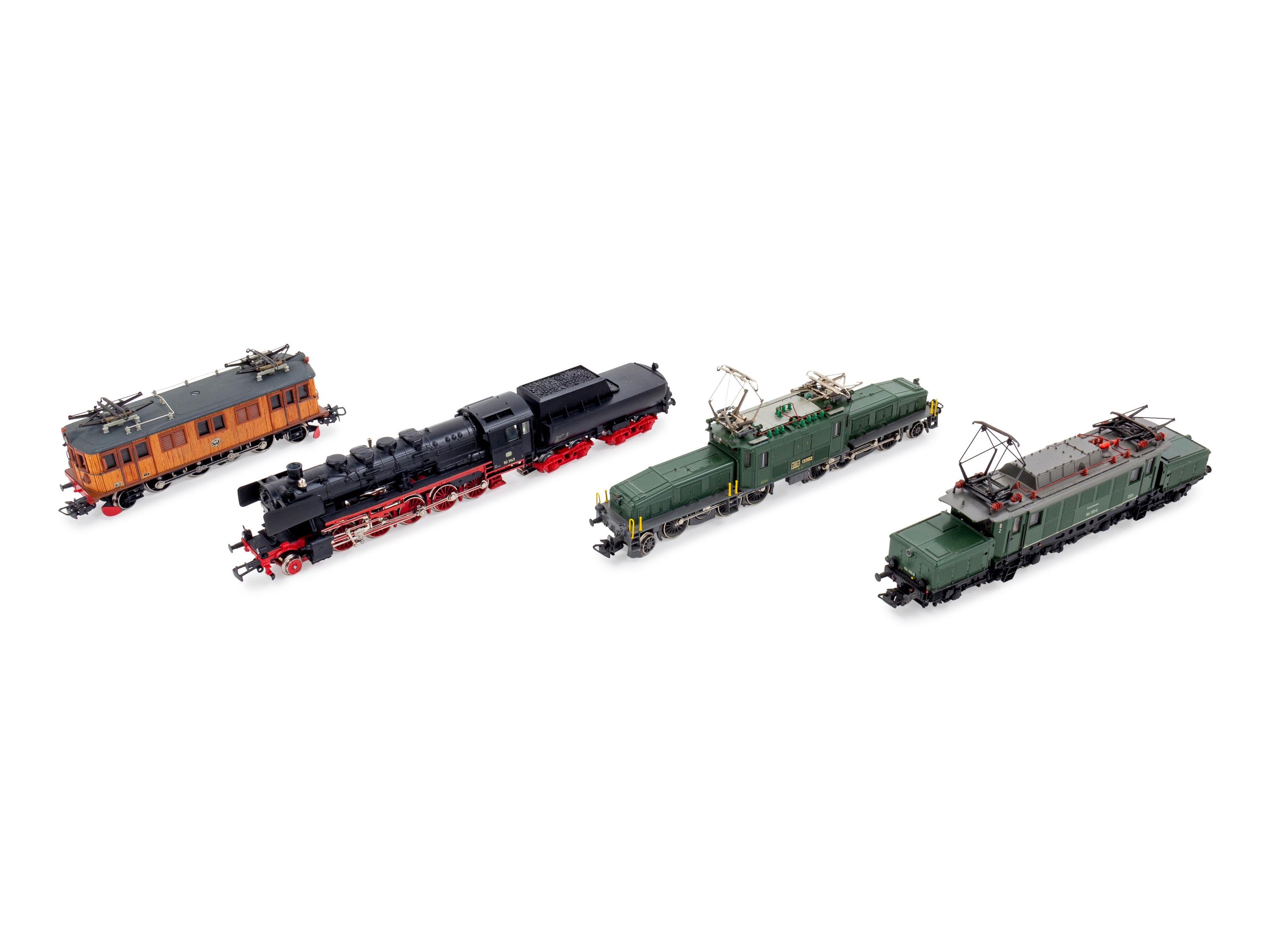 A Group of Four Factory Boxed Marklin HO-Gauge Locomotives