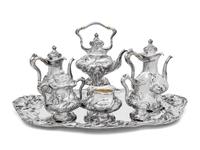 An American Silver Repoussé Eight-Piece Tea and Coffee Service