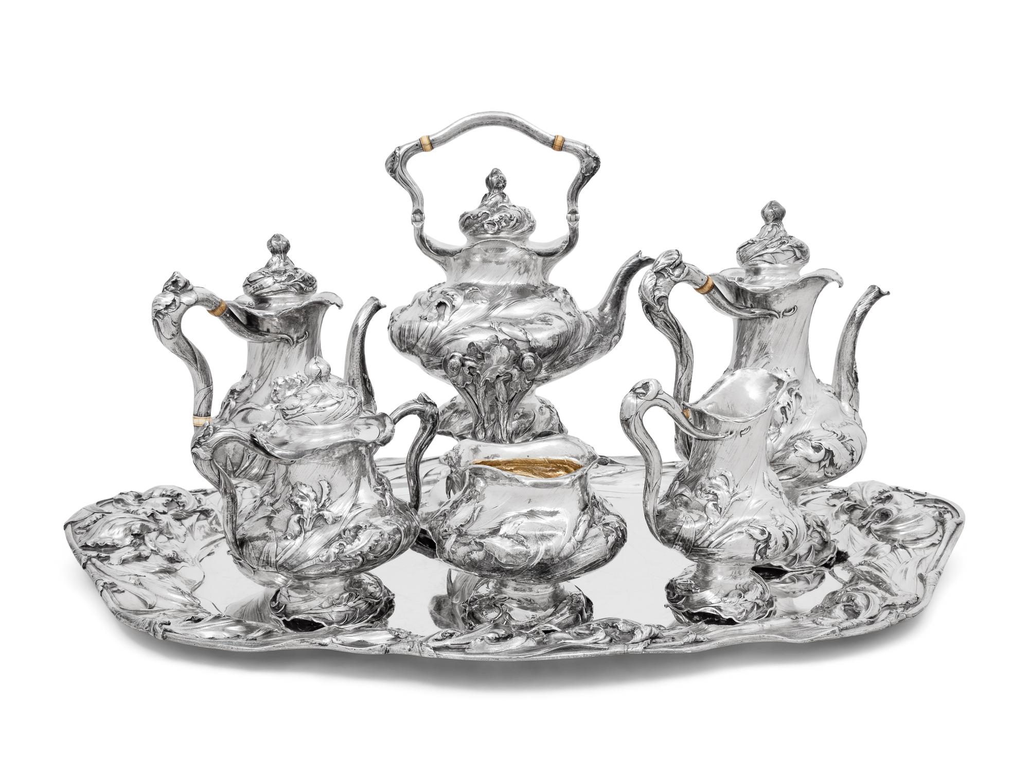 An American Silver Repoussé Eight-Piece Tea and Coffee Service