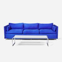 American Modern and Marcel Breuer (American, b. Hungary, 1902-1981) Even Arm Sofa, USA, circa 1960s, and a "Laccio" Coffee Table, designed 1925, the present lot circa 1970s