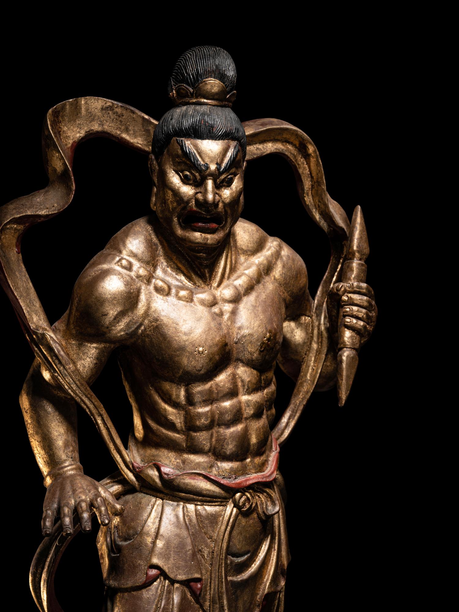 A Pair of Chinese Gilt and Red Lacquered Wood Figures of Wrathful Guardians