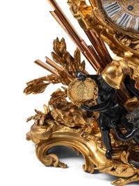 A French Gilt and Patinated Bronze Pendule à la Gloire du Roi