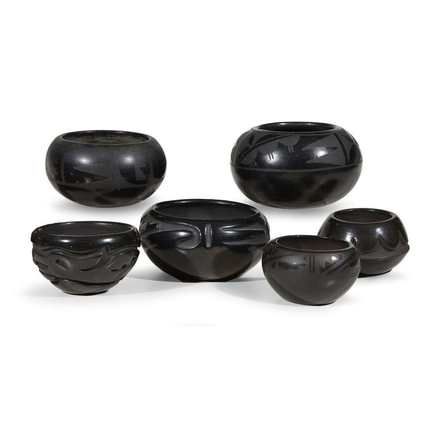 Group of six San Ildefonso and Santa Clara blackware items 20th century