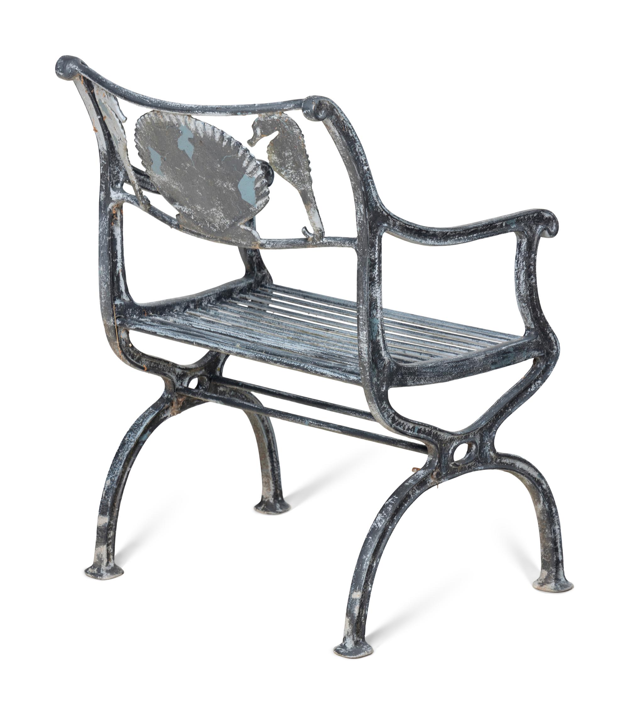 Four Wrought Iron Armchairs