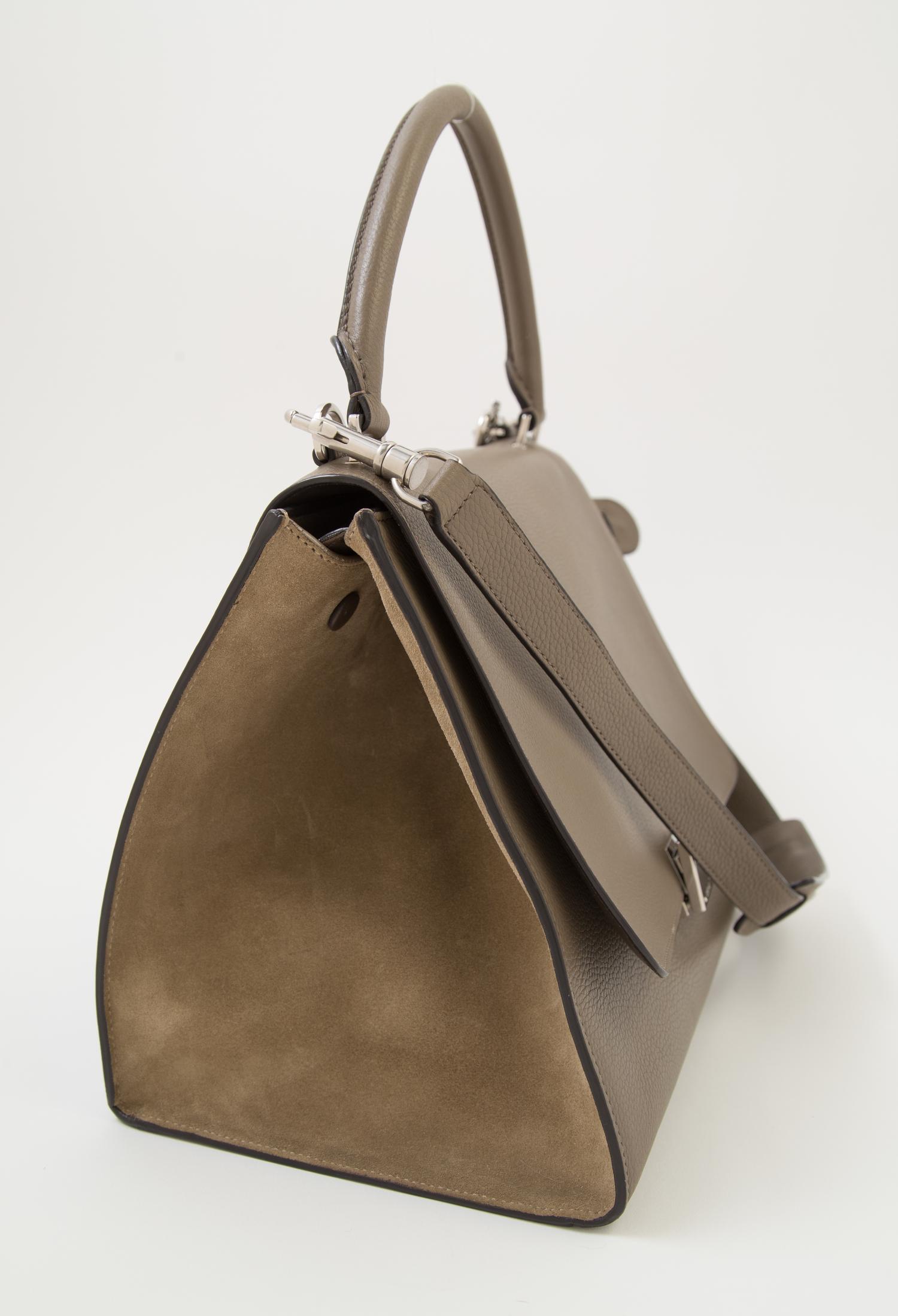 A Celine Taupe Leather and Suede Medium Trapeze Handbag, 11.5"- 20" L x 9" H x 7"- 9" W; Top handle: 4.5"; Strap drop: 15".