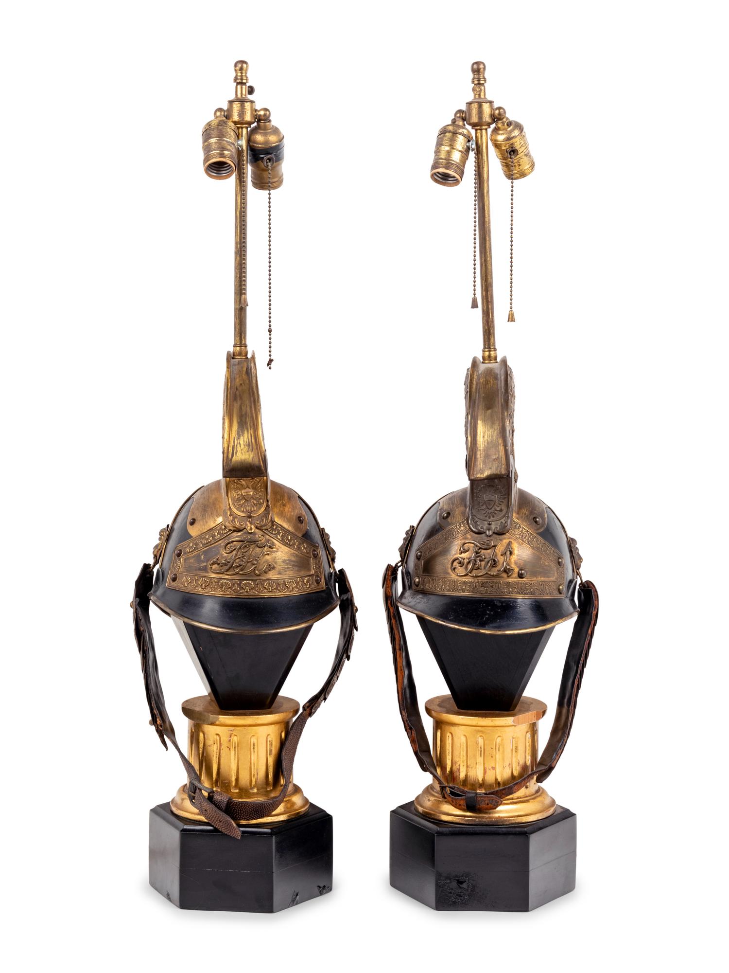A Pair of Continental Parade Helmets Mounted as Lamps