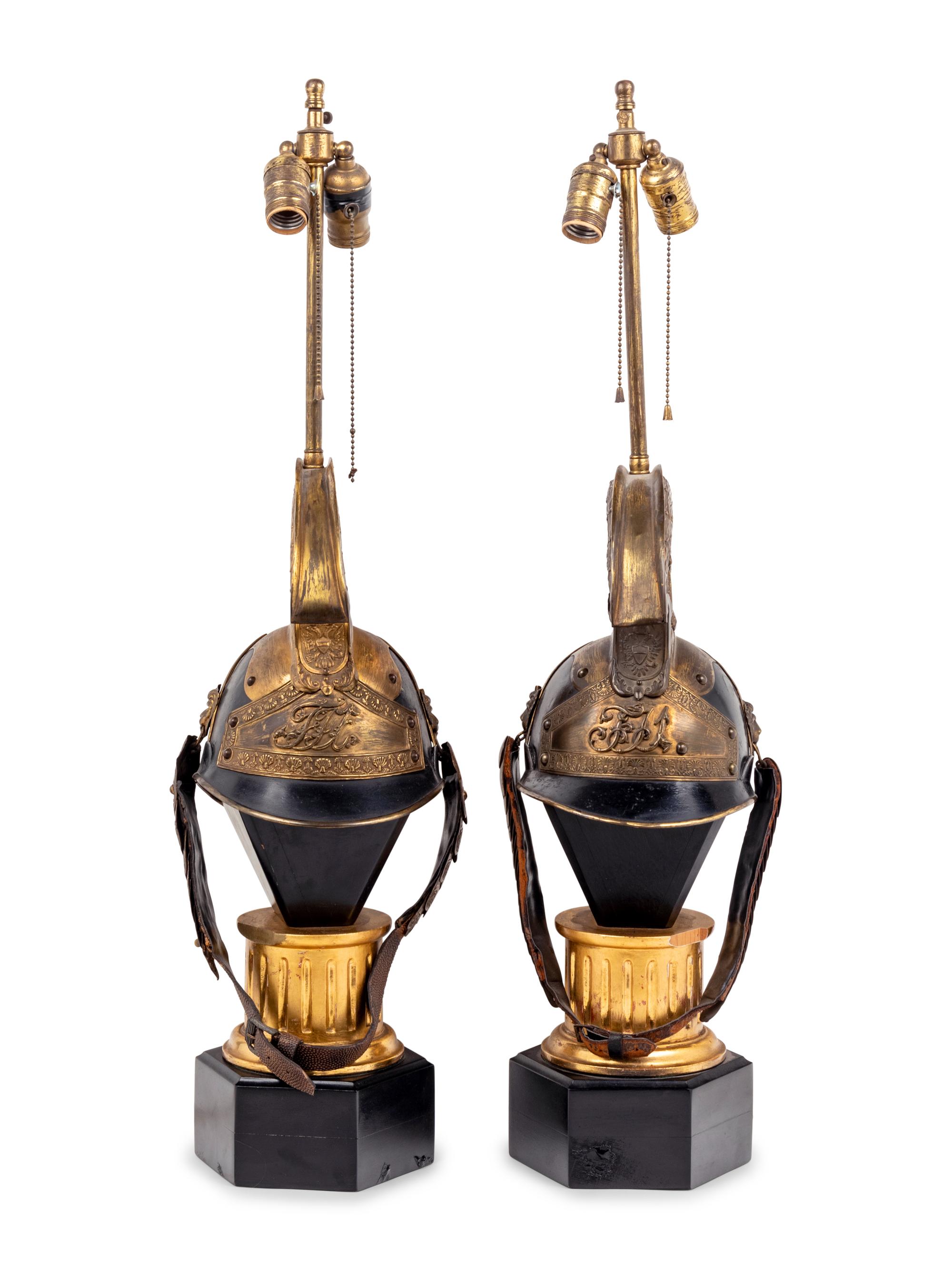 A Pair of Continental Parade Helmets Mounted as Lamps
