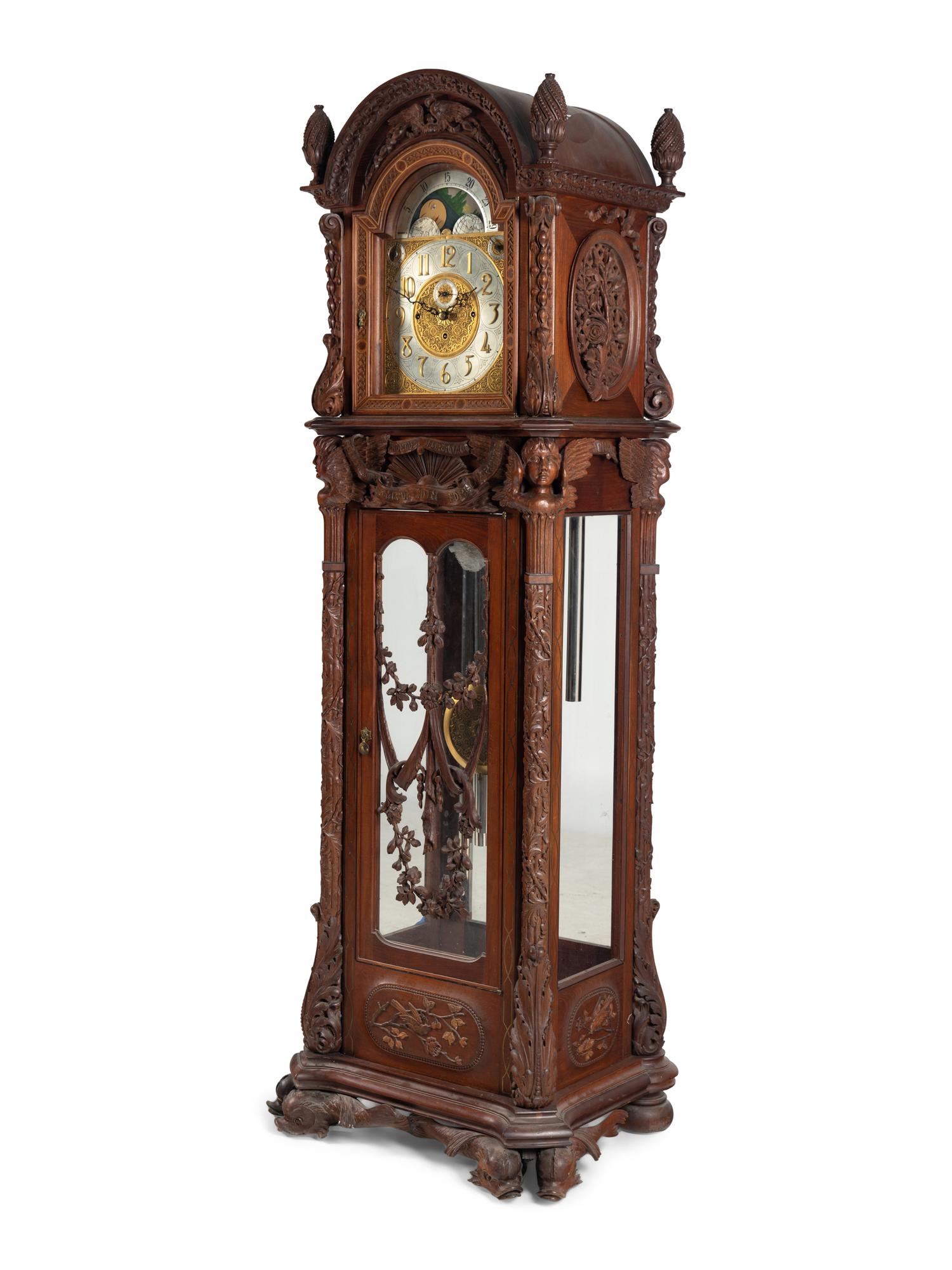 A Renaissance Revival Carved Mahogany Tube-Striking Tall Case Clock