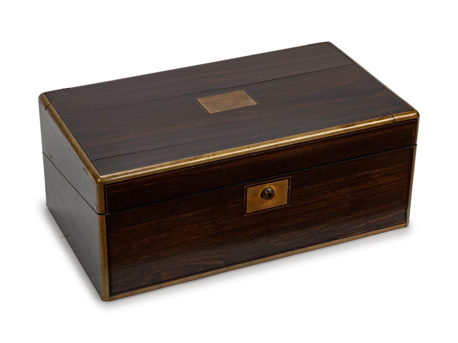 A Victorian Brass-Inlaid Mahogany Lap Desk — CIRCA 1873