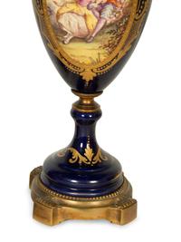A Pair Gilt Metal Mounted Sèvres Style Porcelain Urns