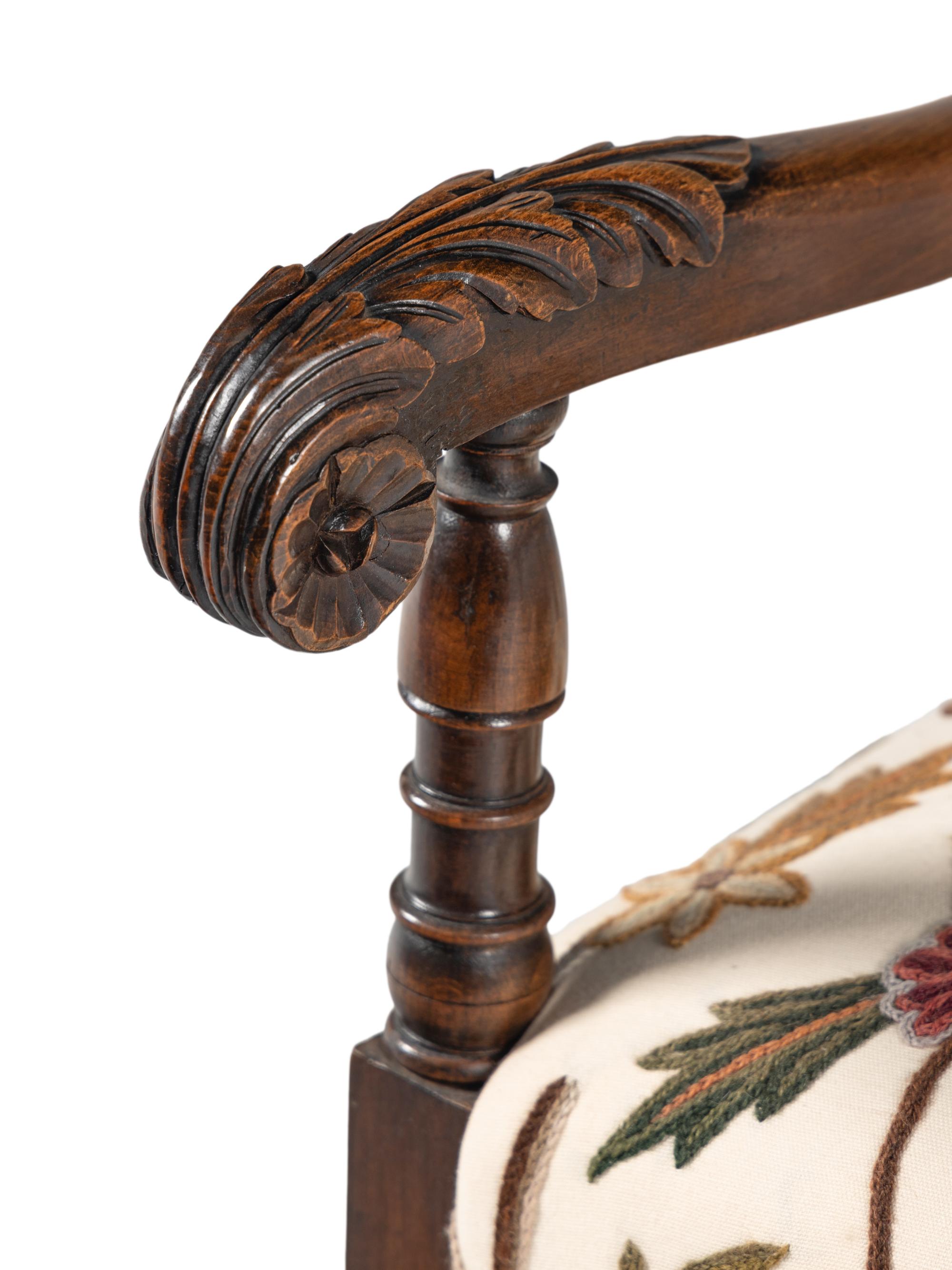 A William and Mary Style Walnut Armchair with Crewelwork Upholstery