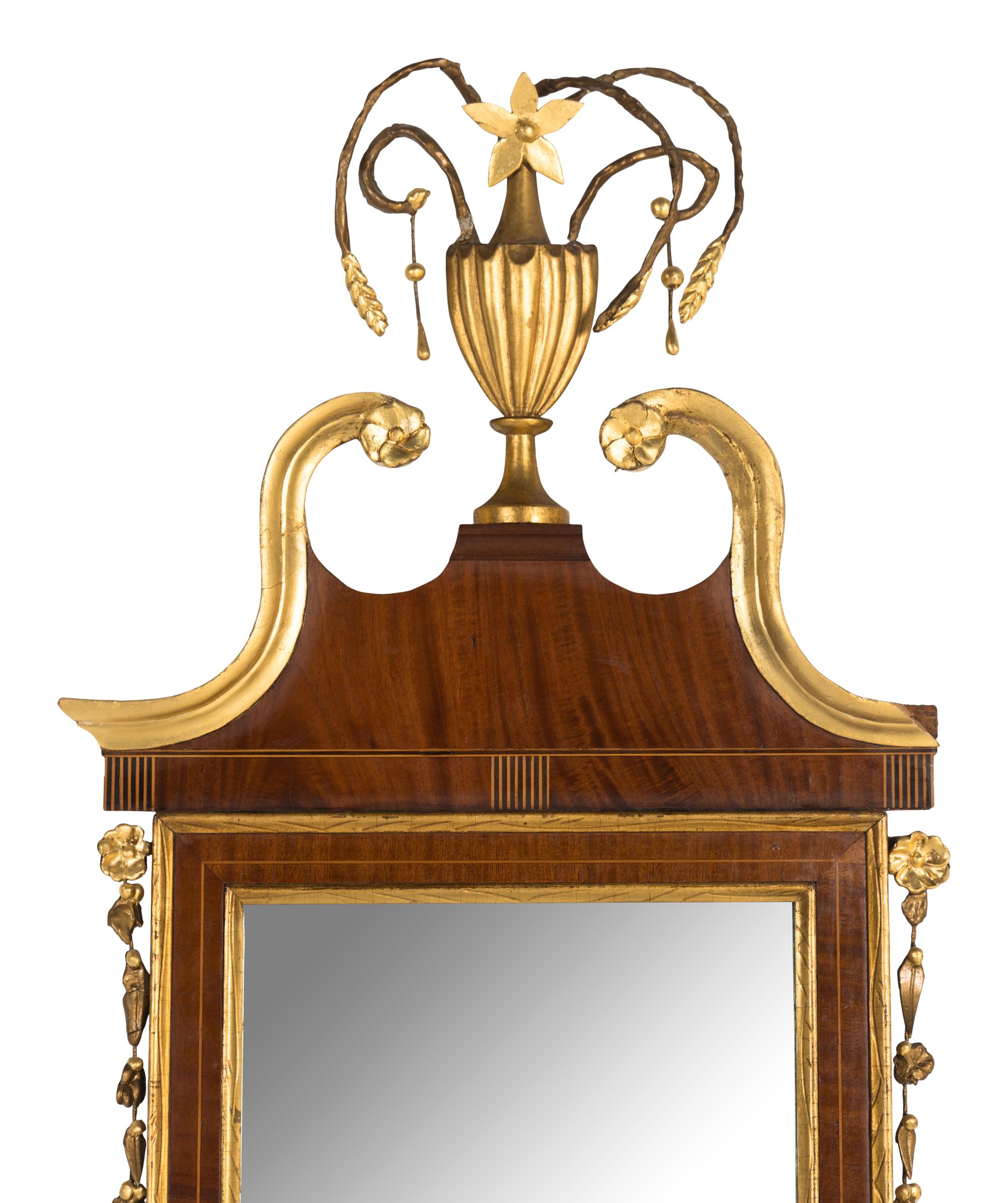 A George III Style Parcel-Gilt Mahogany Mirror