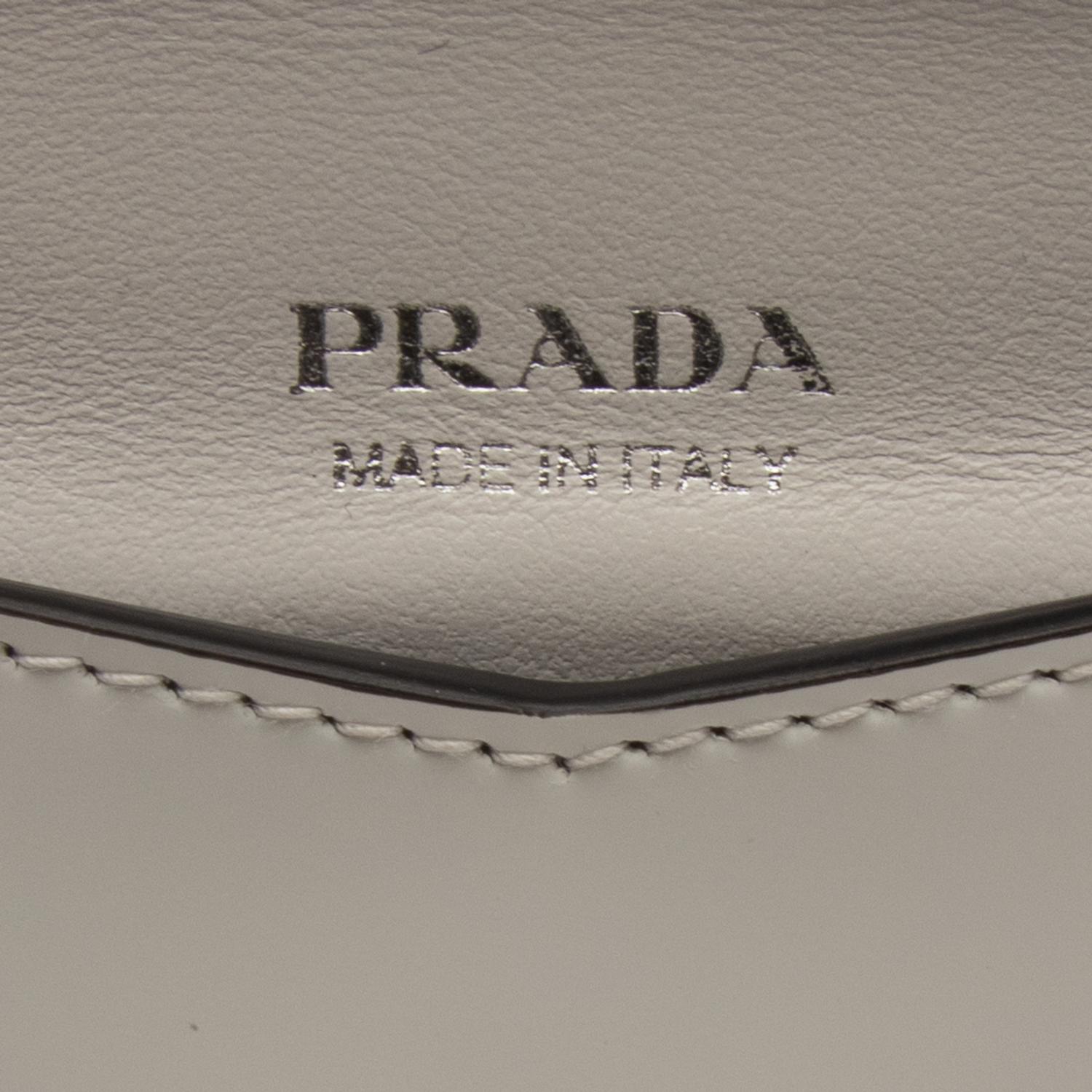 PRADA, WHITE LEATHER WRISTLET CLUTCH