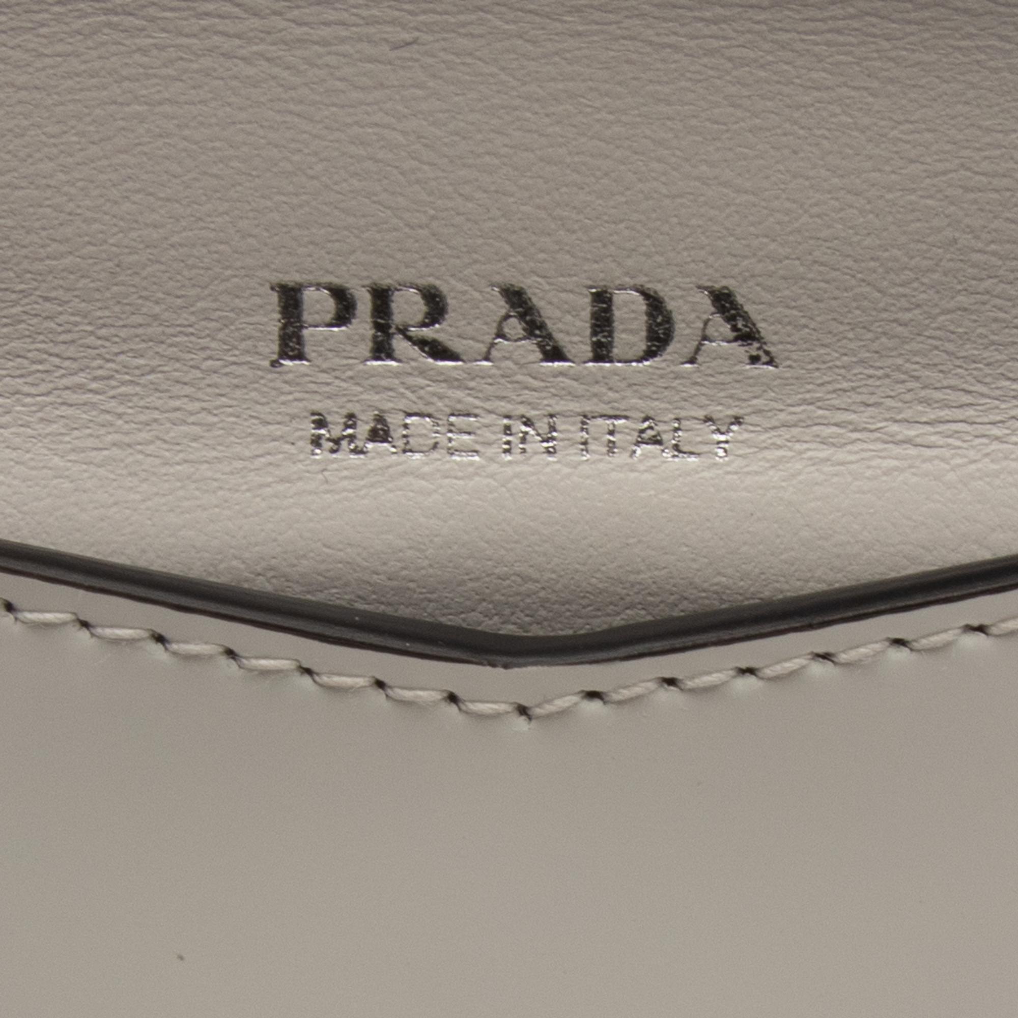 PRADA, WHITE LEATHER WRISTLET CLUTCH