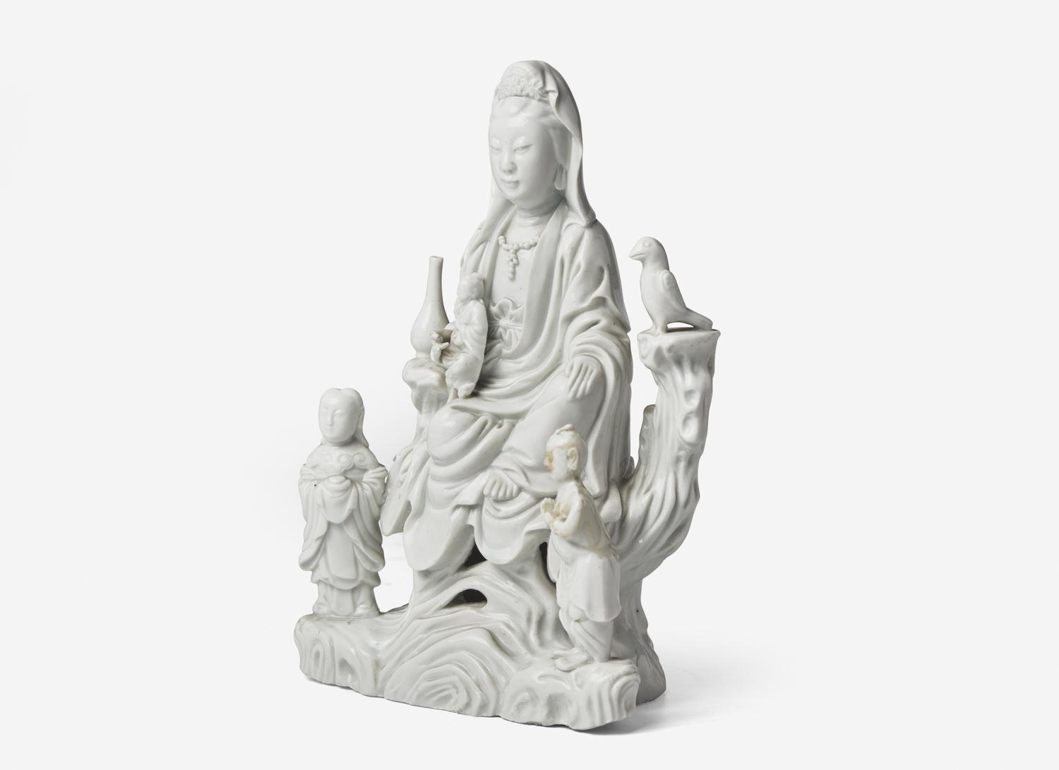 A Chinese Blanc-de-Chine Porcelain Figural Group of Guanyin and Attendants