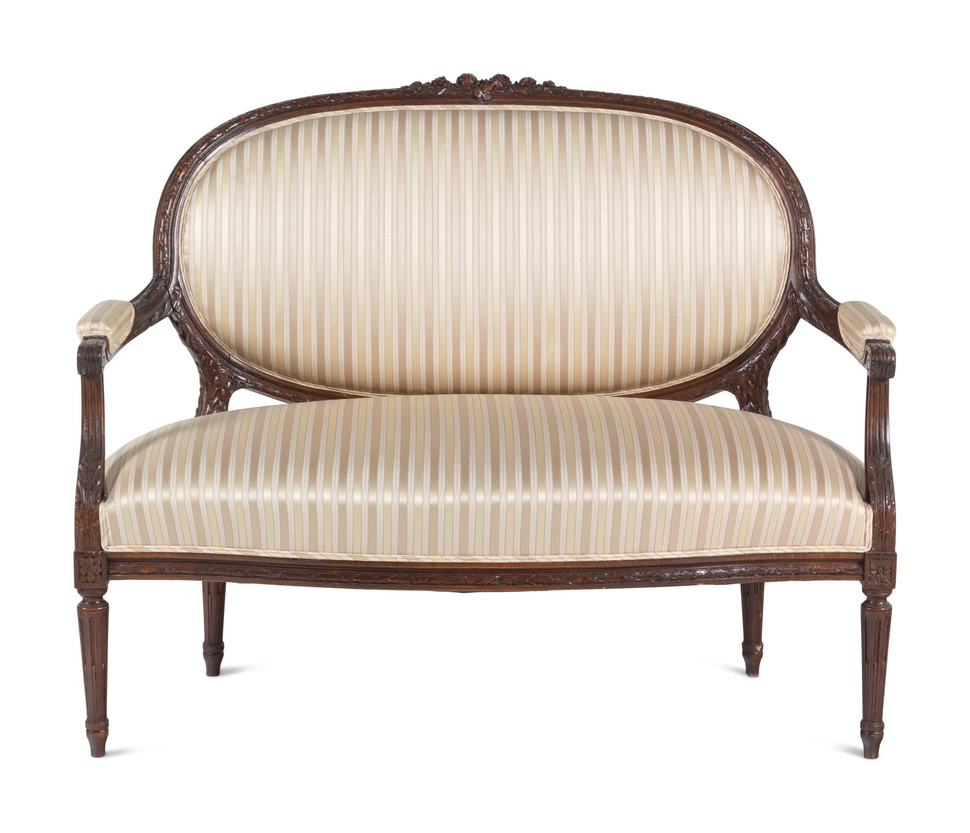 A Louis XVI Style Three-Piece Seating Suite