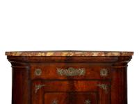 An Empire Gilt Bronze Mounted Mahogany Encoignure with a Brèche d'Alep Marble Top