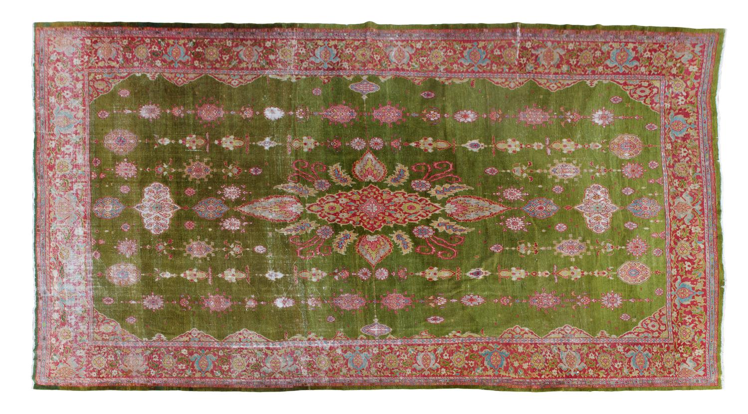 A Persian Wool Rug 12 feet 2 1/2 inches x 16 feet 4 1/2 inches.