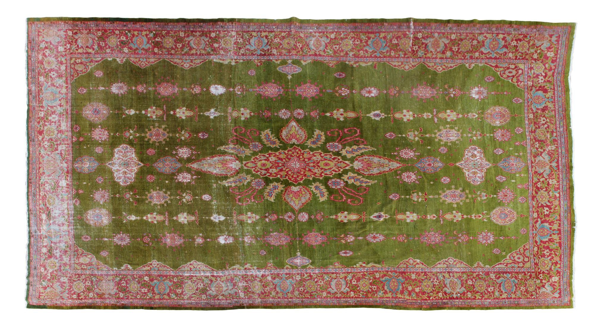A Persian Wool Rug 12 feet 2 1/2 inches x 16 feet 4 1/2 inches.