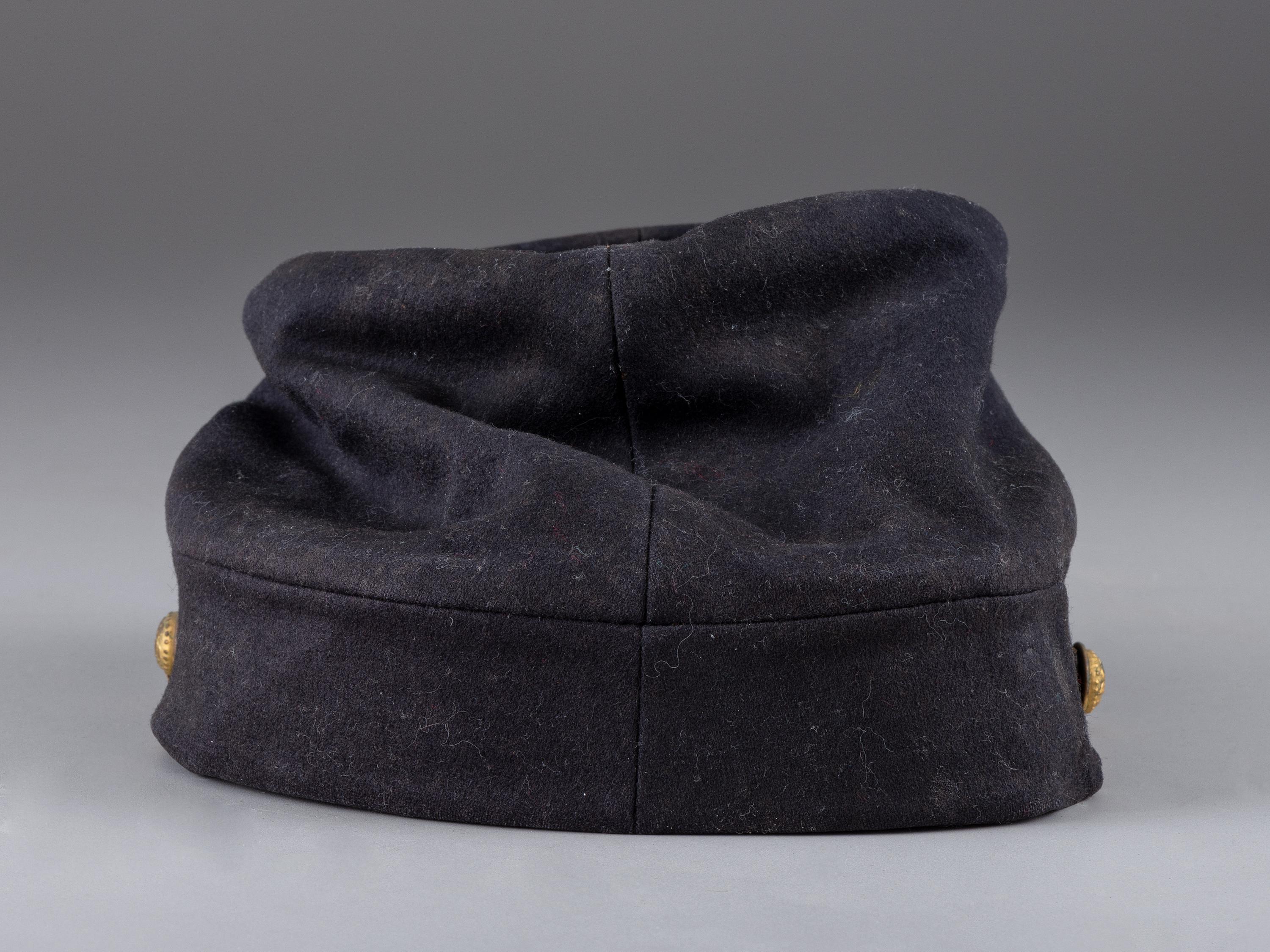 [CIVIL WAR]. 4th Rhode Island Infantry kepi identified to Captain Martin Page Buffum, POW at Petersburg. [ With :] ALLEN, George H. Forty-Six Months with the Fourth R.I. Volunteers.