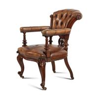 An English Walnut and Leather-Upholstered Armchair
