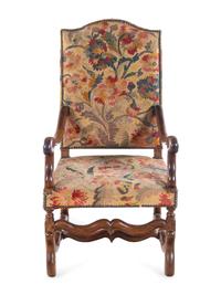 A Louis XIV Walnut Fauteuil à la Reine with Needlework Upholstery