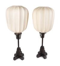 A Pair of Chinese Style Pierced and Ebonized Wood Table Lamps — MID-20TH CENTURY