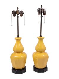 A Pair of Yellow Glazed Pottery Lamps