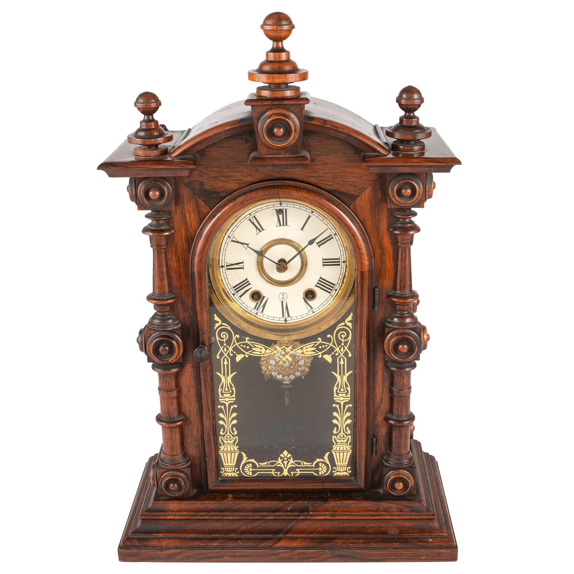 A Carved Rosewood Welch 'Patti VP' Shelf Clock