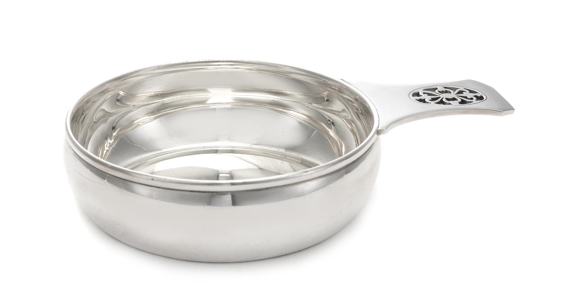 An American Silver Porringer, Tiffany & Co., New York, NY, Early 20th Century, having a pierced handle.