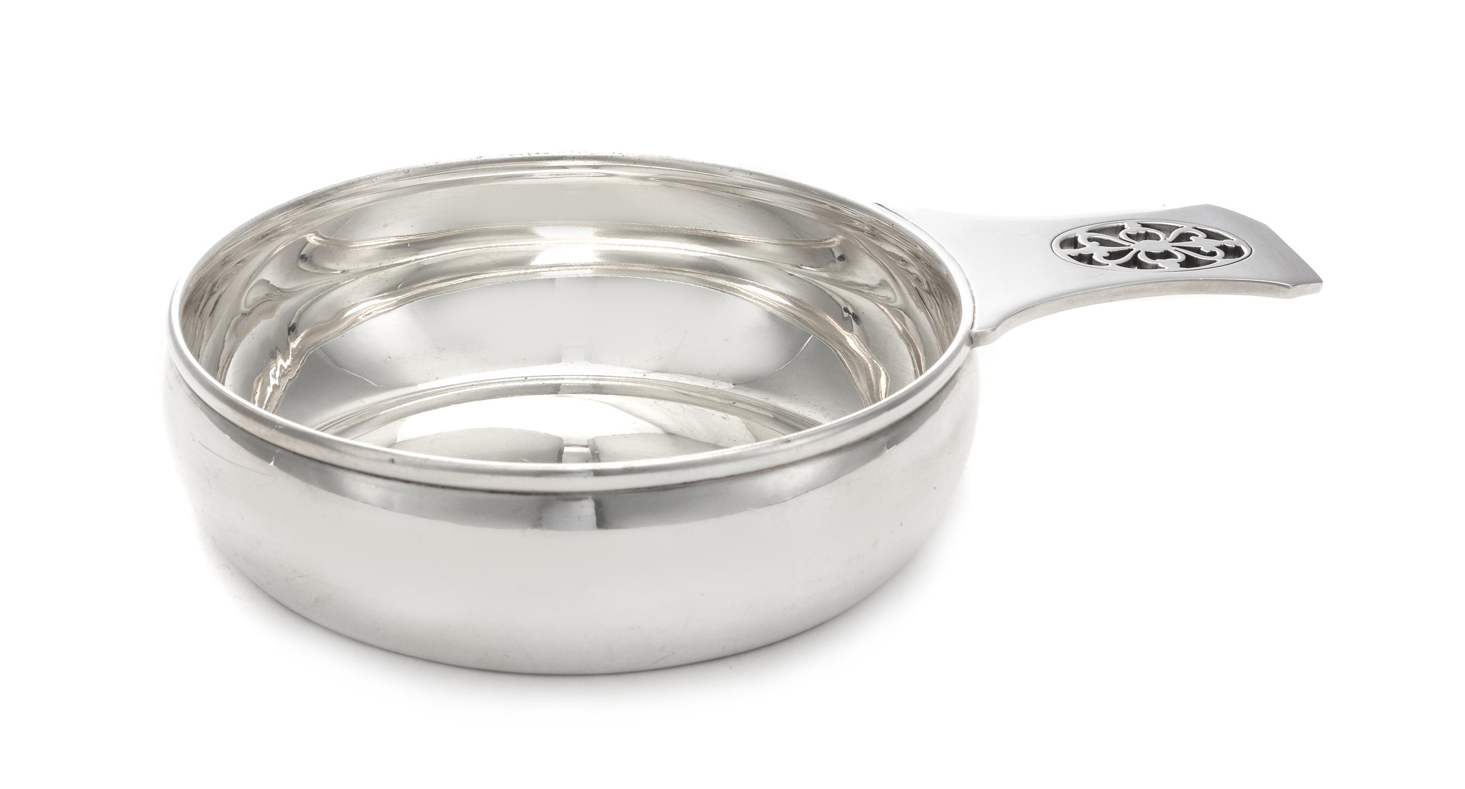 An American Silver Porringer, Tiffany & Co., New York, NY, Early 20th Century, having a pierced handle.