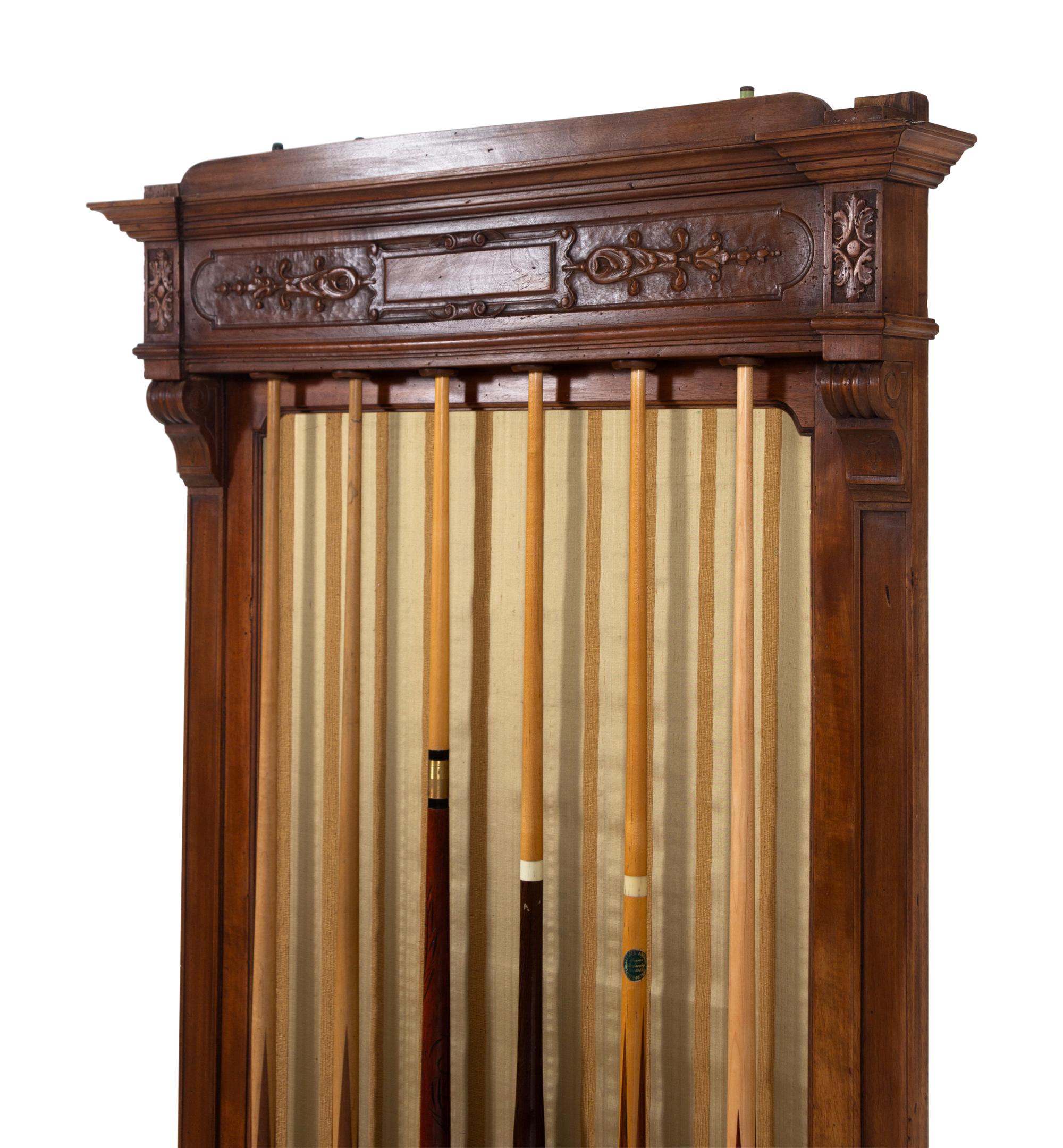 A Carved Walnut Billiards Cue Rack with a Set of Wood Scoring Beads