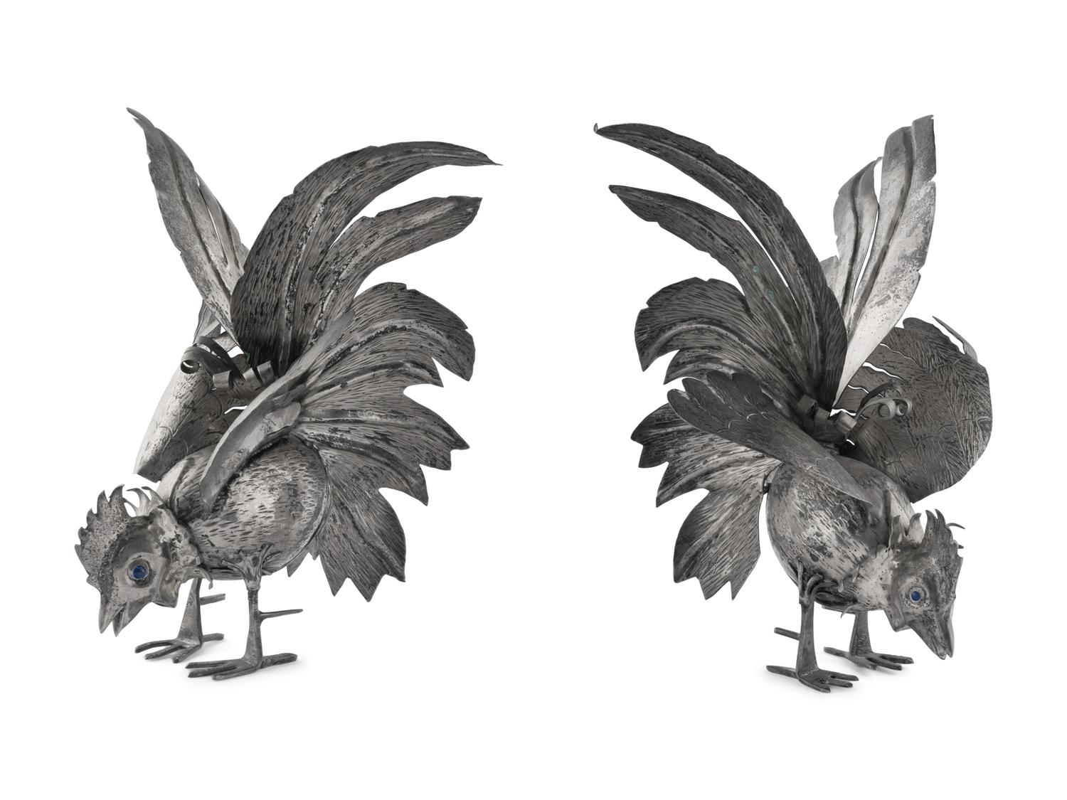 A Pair of Continental Silvered-Metal Roosters