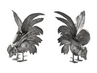 A Pair of Continental Silvered-Metal Roosters