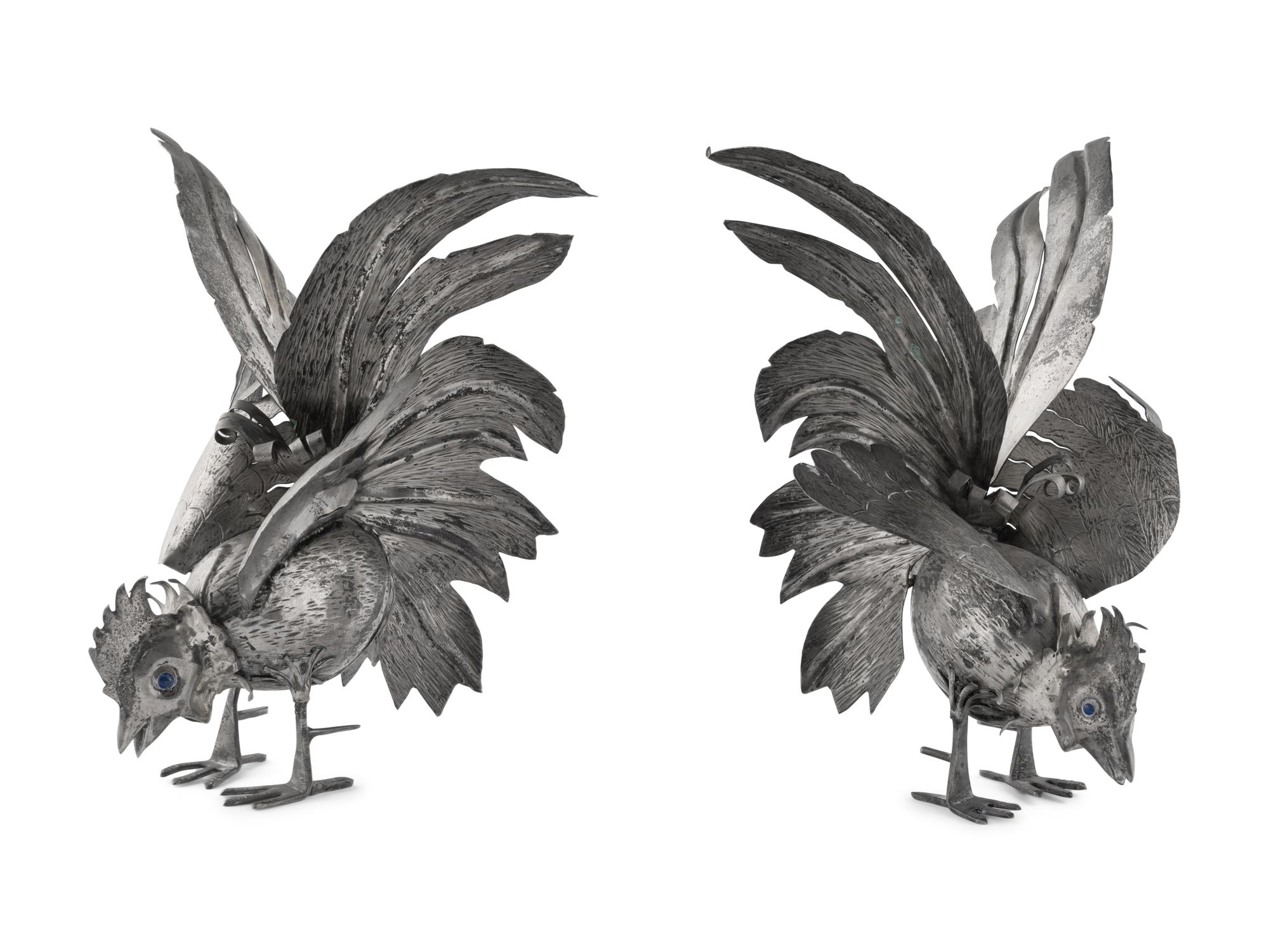 A Pair of Continental Silvered-Metal Roosters