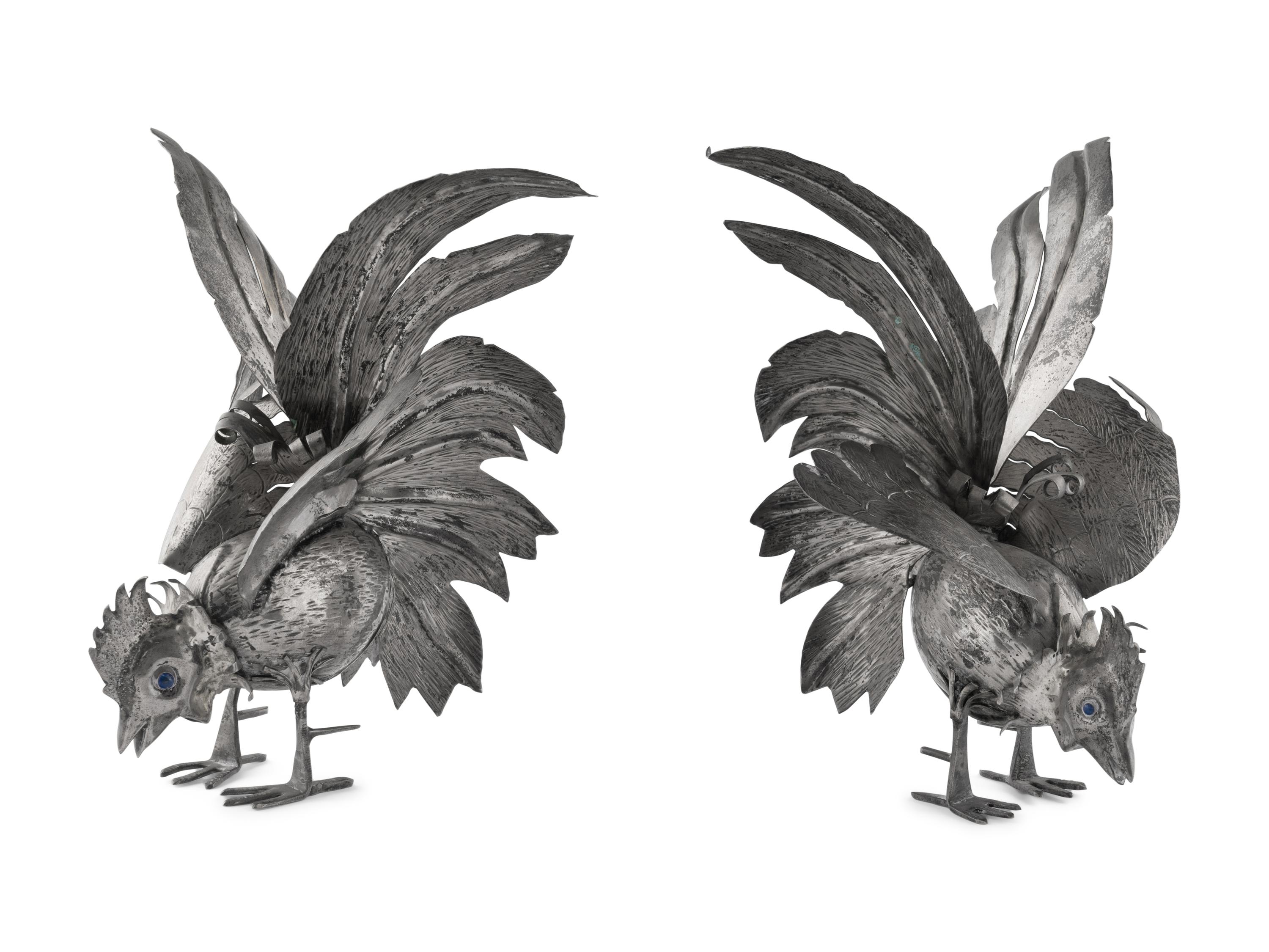 A Pair of Continental Silvered-Metal Roosters