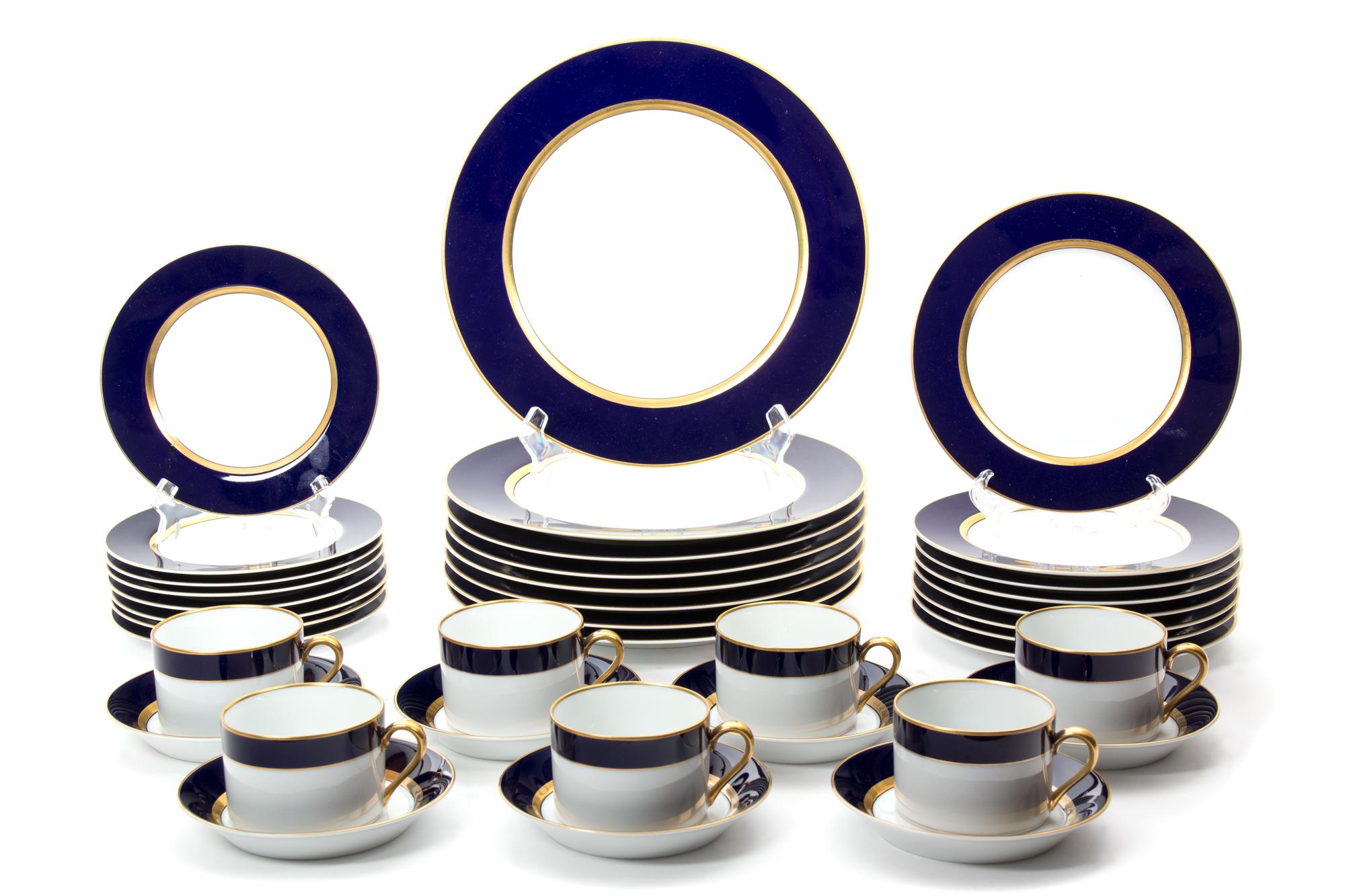 A Partial Fitz and Floyd Porcelain Dinner Service Diameter of first 10 1/4 inches