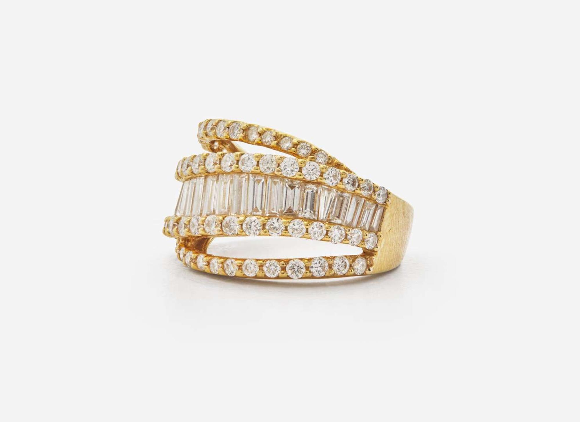 A Ladies 18K Yellow Gold and Diamond Ring