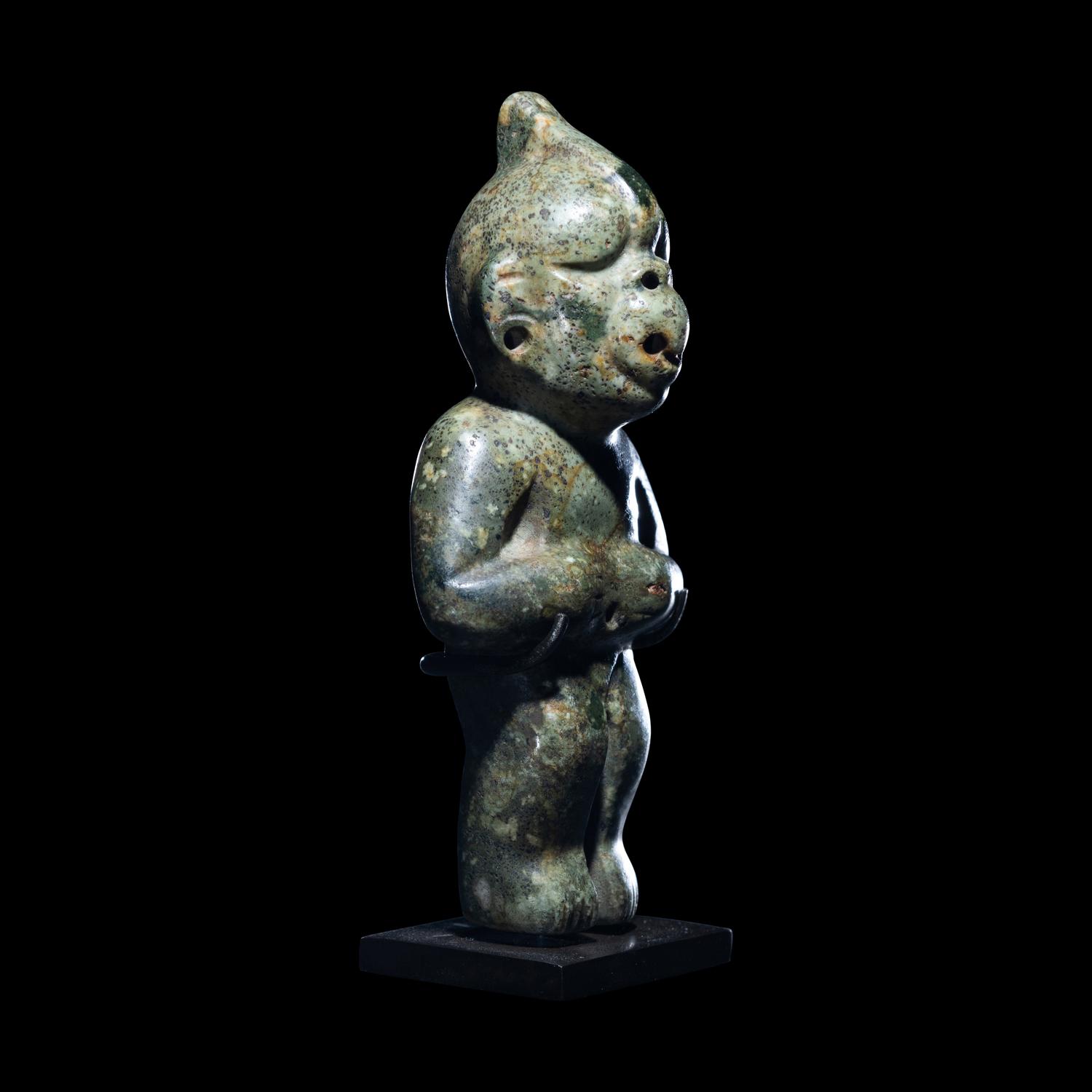 An Olmec Jade Transformation Figure