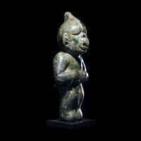 An Olmec Jade Transformation Figure