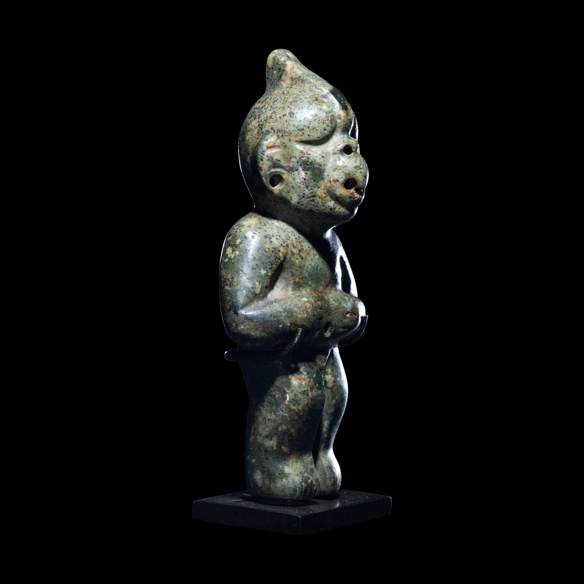 An Olmec Jade Transformation Figure