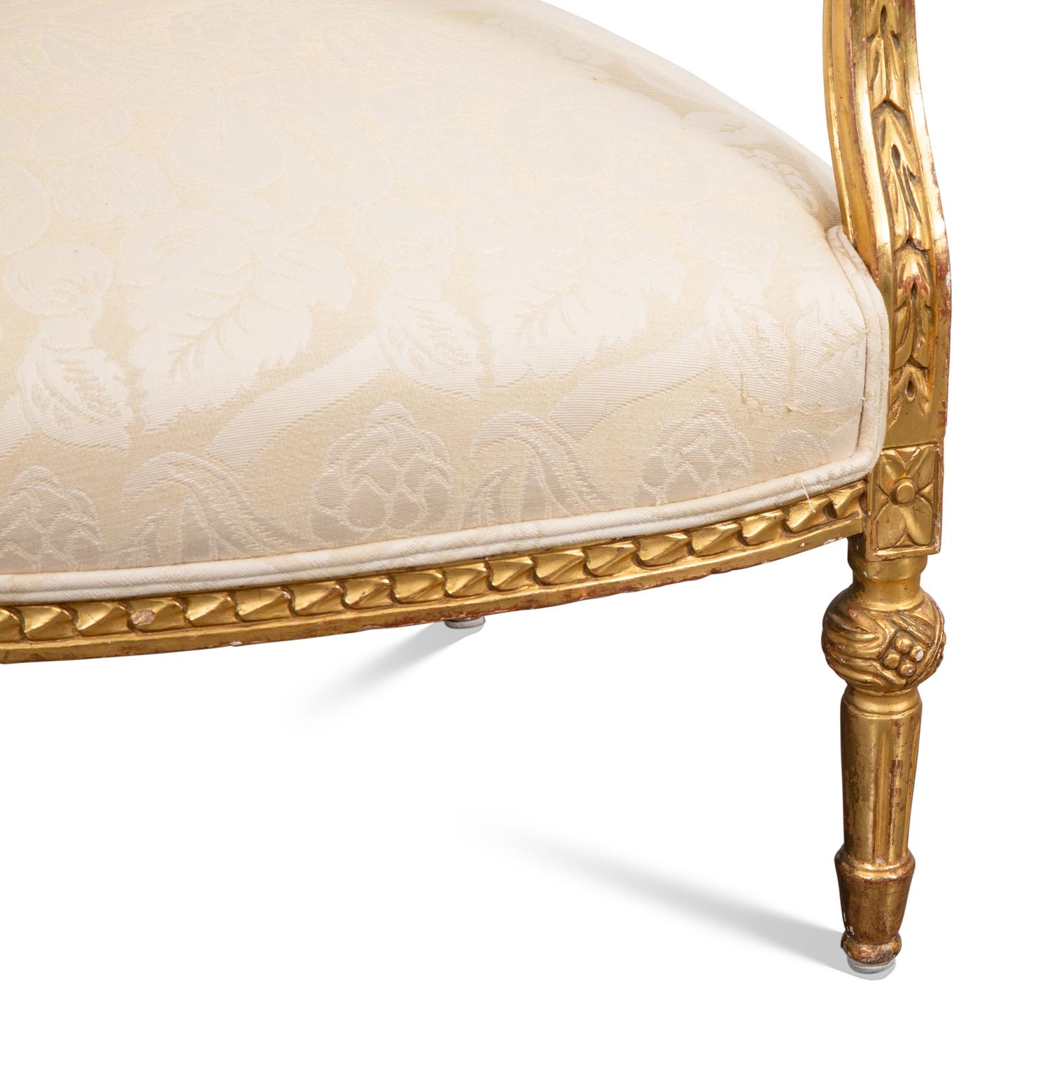A Pair of Louis XVI Style Giltwood Fauteuils
