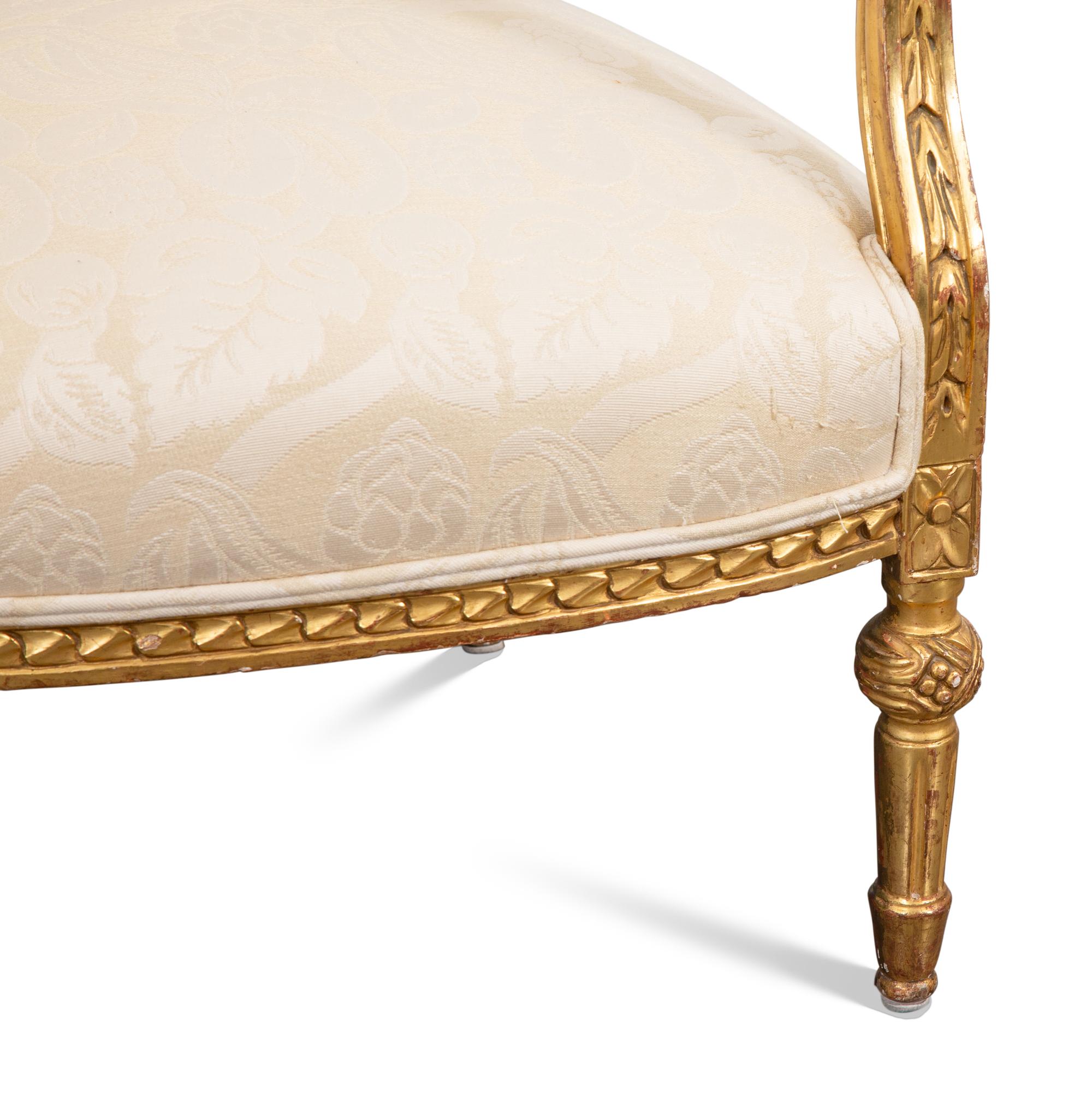 A Pair of Louis XVI Style Giltwood Fauteuils