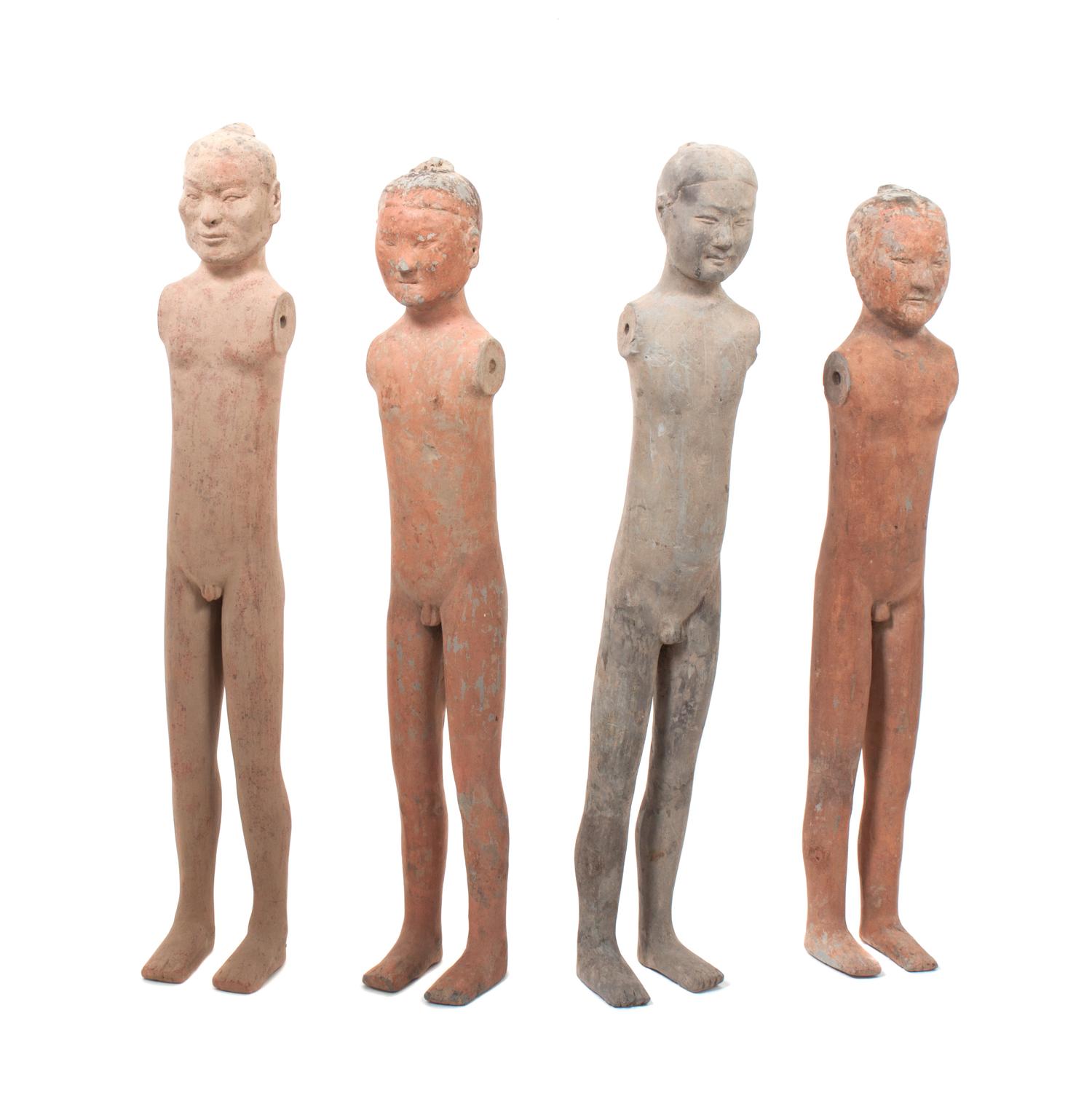 Four Chinese Pottery Figures of Males Height of tallest 23 3/4 inches.